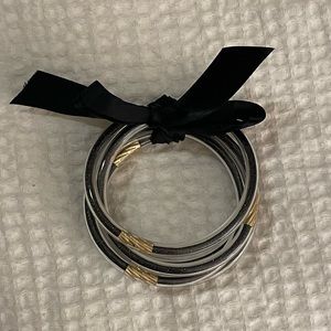 Waterproof black glitter bangles with gold accents!
